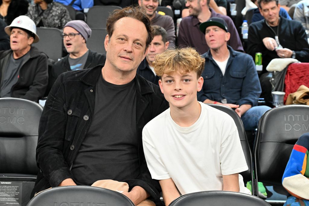 Vince and Vernon Lindsay Vaughn attend a basketball game between the Los Angeles Clippers and the Los Angeles Lakers 